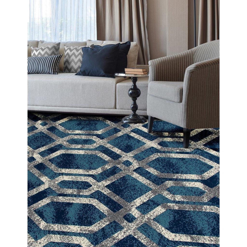 

    
Cachi Fretwork Blue/Gray 2 ft. 2 in. x 3 ft. 11 in. Area Rug by Art Carpet
