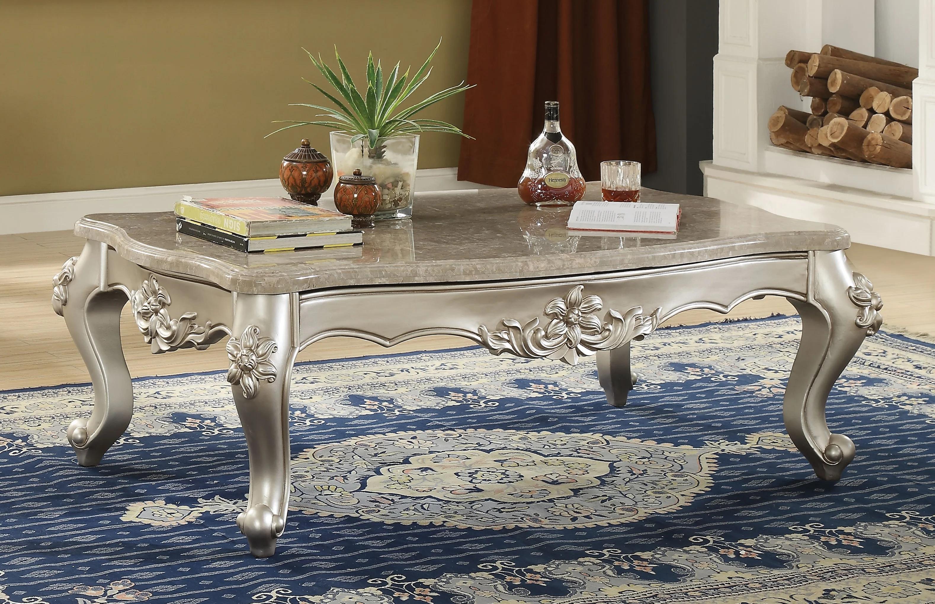 

    
Classic Beige Marble & Champagne Coffee Table by Acme Bently 81665
