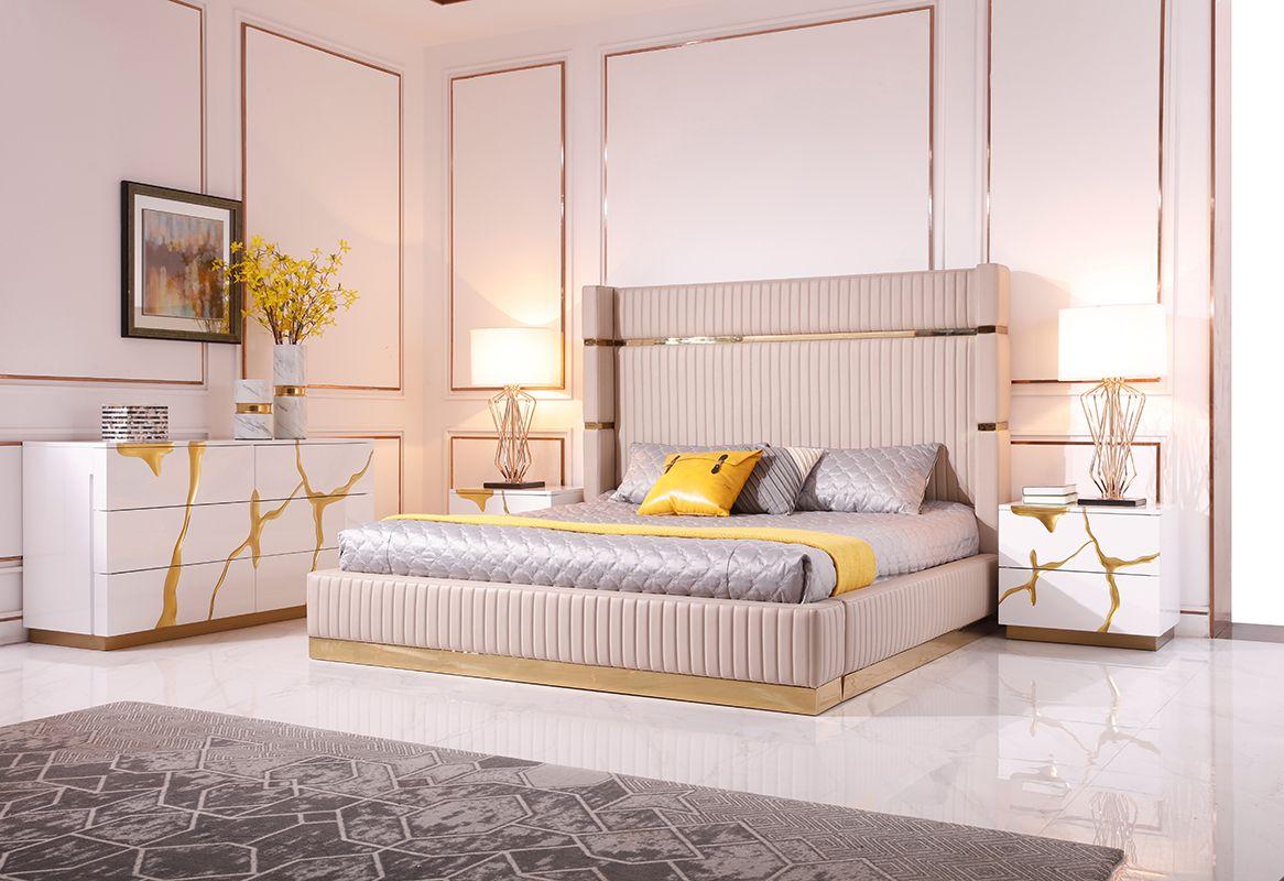 

    
Glam Beige Leather & Gold CAL King Platform Bedroom Set 5Pcs by Modrest Sterling

