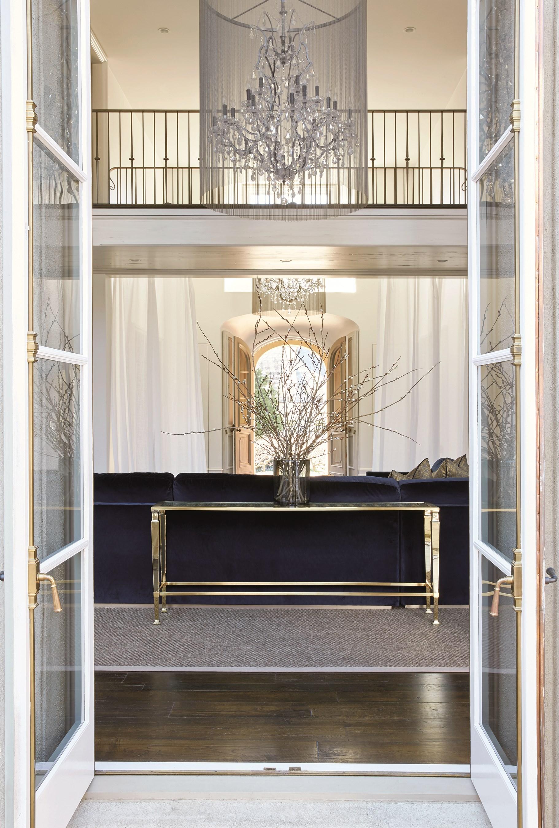 

    
Glass Top & Brushed Majestic Gold Frame THE ARABESQUE CONSOLE by Caracole
