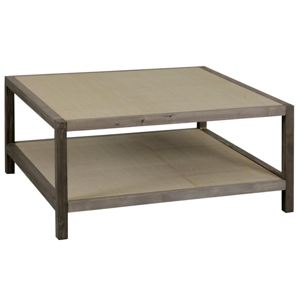 

    
Gray Driftwood Cocktail Table w/Raffia Fabric Top & Bottom Shelf By StyleCraft
