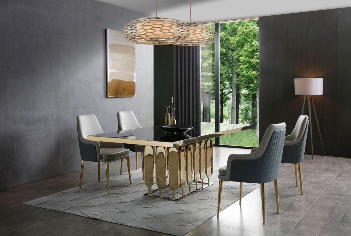 

    
Modern Black Glass & Gold Dining Table + 4 Chairs by VIG Modrest Griffith
