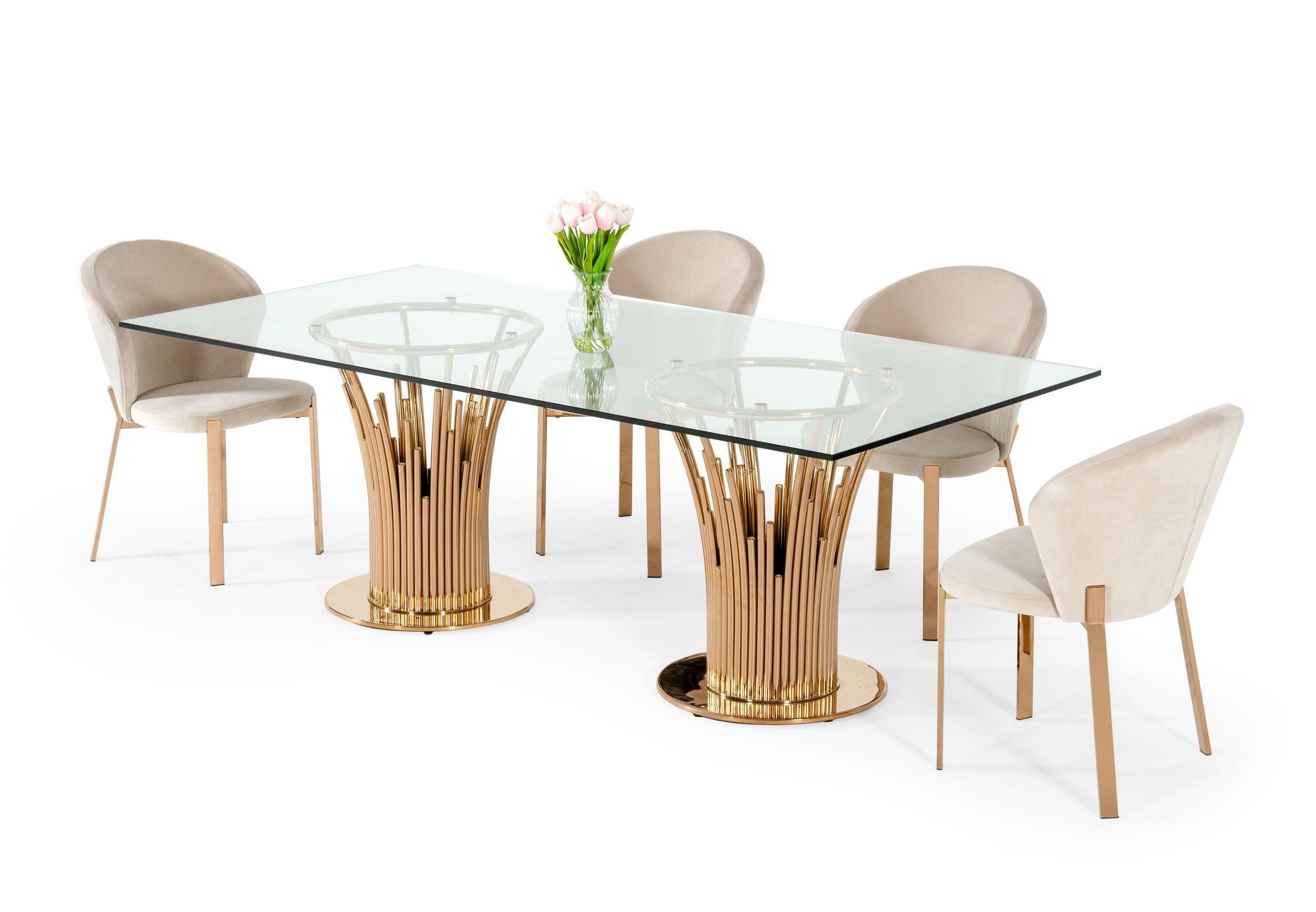 

    
Modern Glass & Rosegold Dining Table + 4 Chairs by VIG Modrest Paxton
