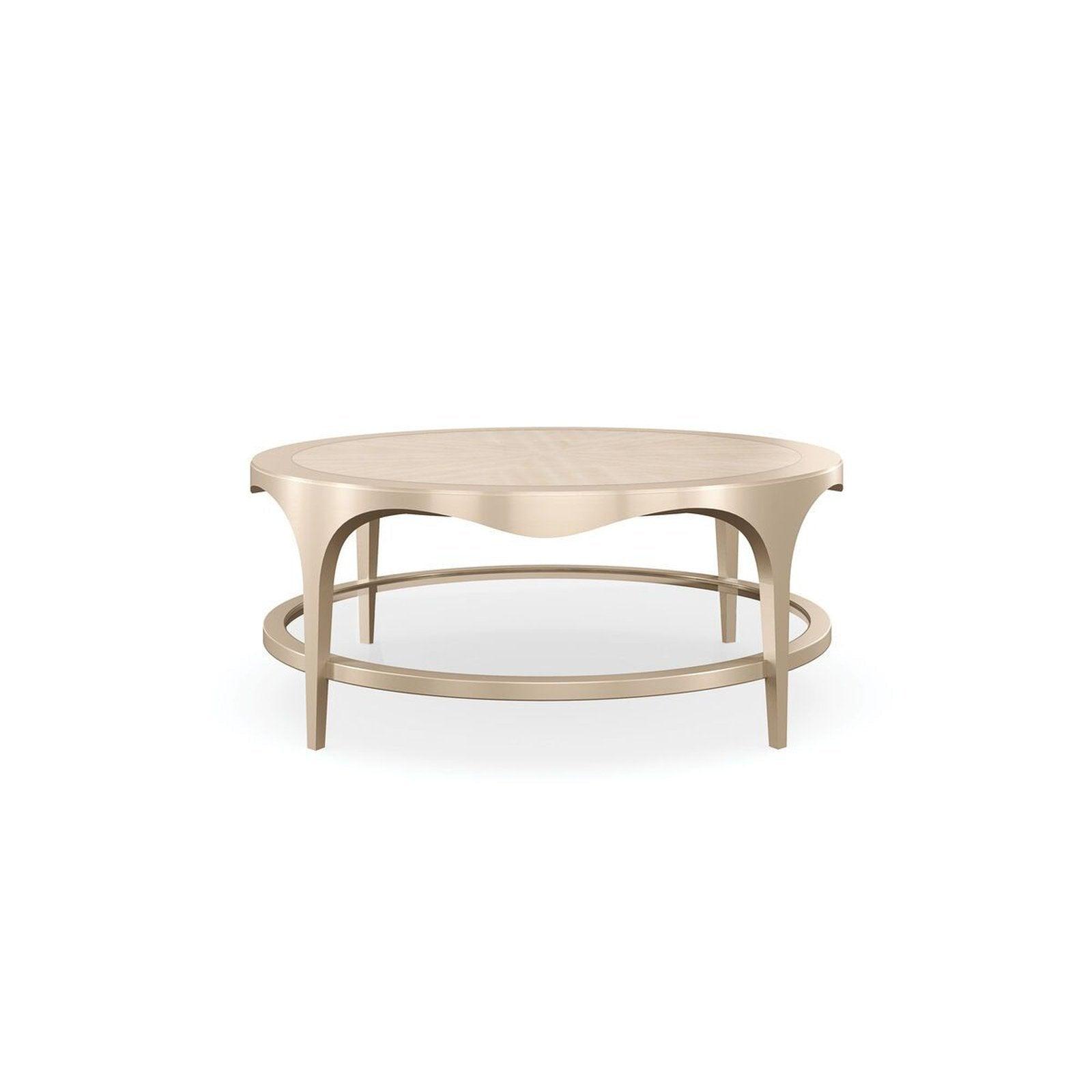 

    
Natural Glow & Champagne Pearl Finish Coffee Table DOWN AND UNDER by Caracole
