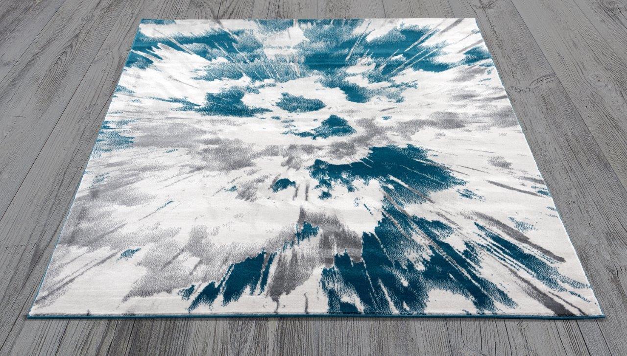 

    
Addison Blue Burst Area Rug 5x8 by Art Carpet
