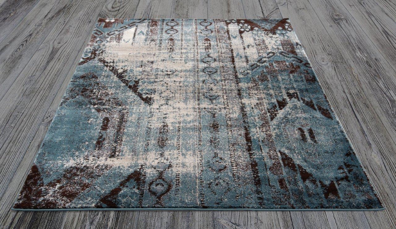 

    
Addison Blue Graphic Pattern Area Rug 5x8 by Art Carpet
