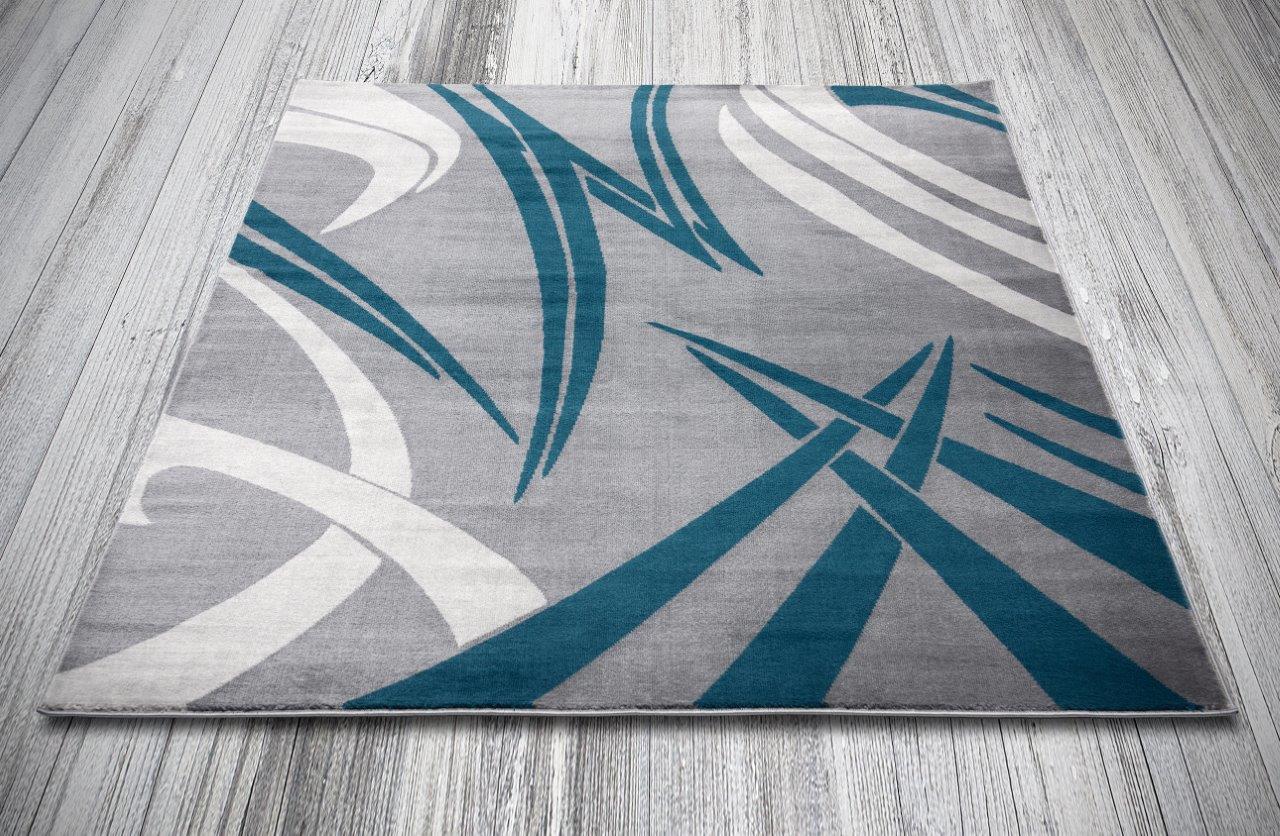 

    
Addison Gray and Blue Geometric Area Rug 5x8 by Art Carpet
