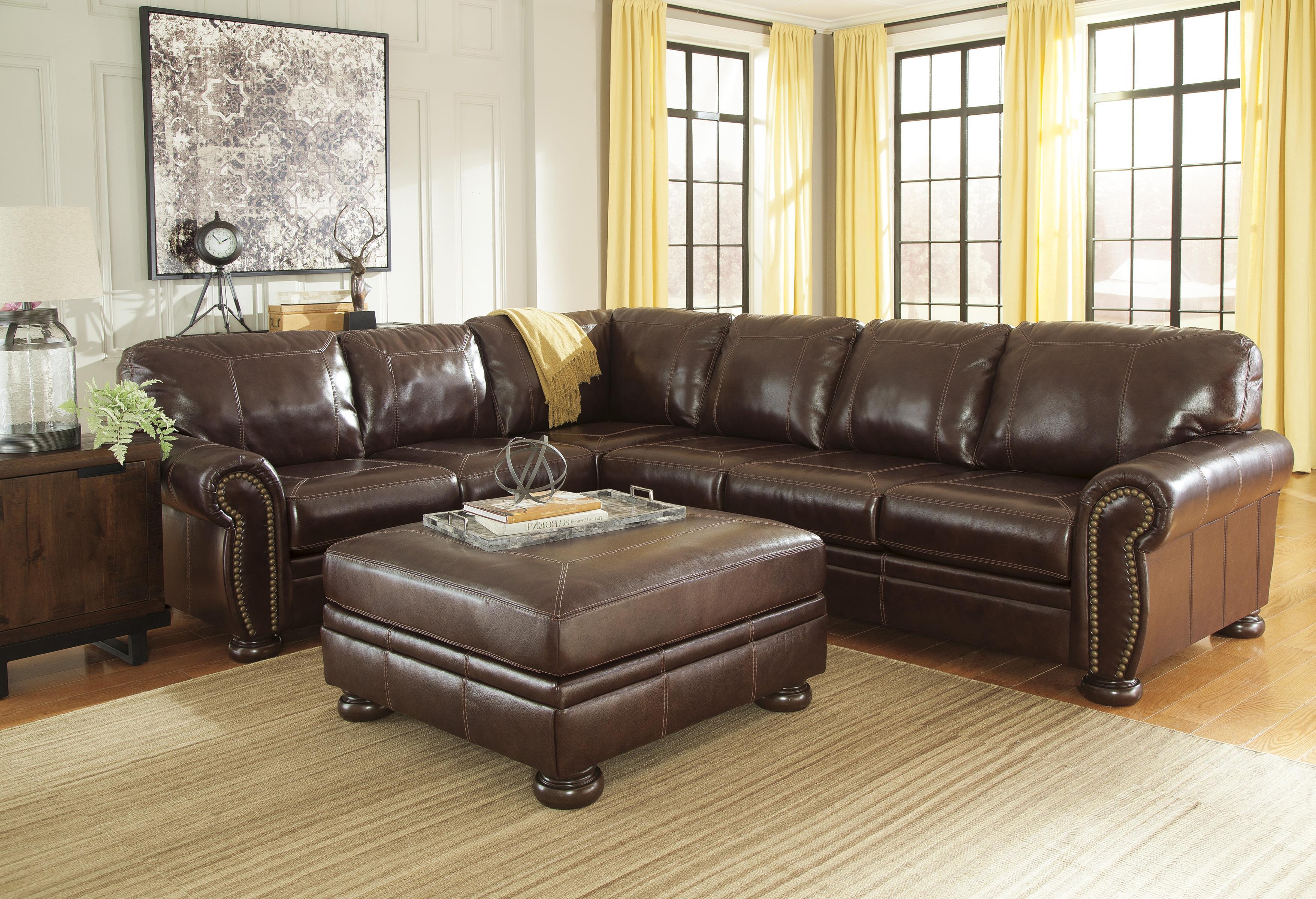 

    
Ashley Banner Living Room RAF Sectional with Armless Chair
