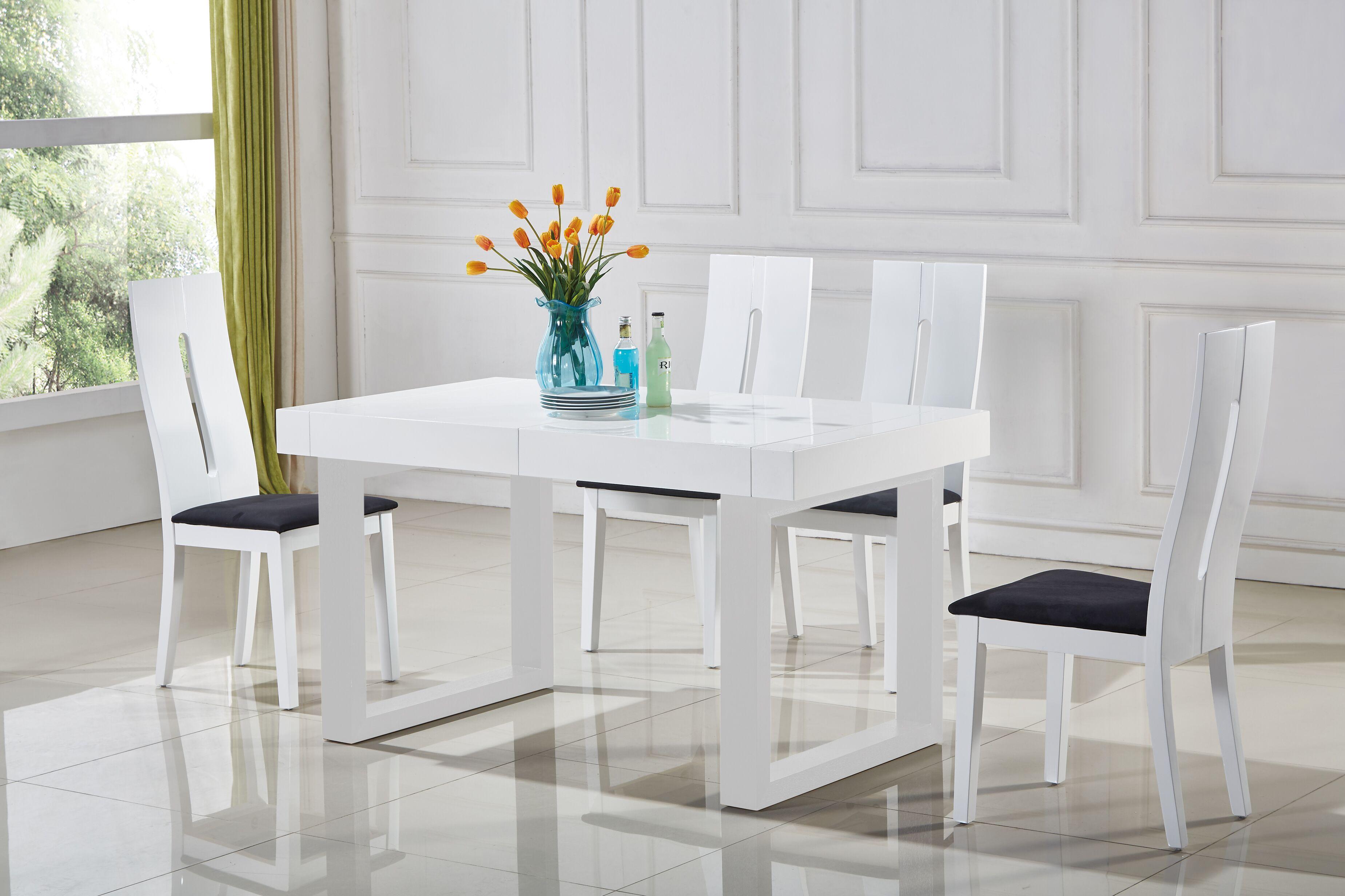 

    
At Home USA Laura White Glossy Ultra Modern Extendable Dining Table Set 5Pcs
