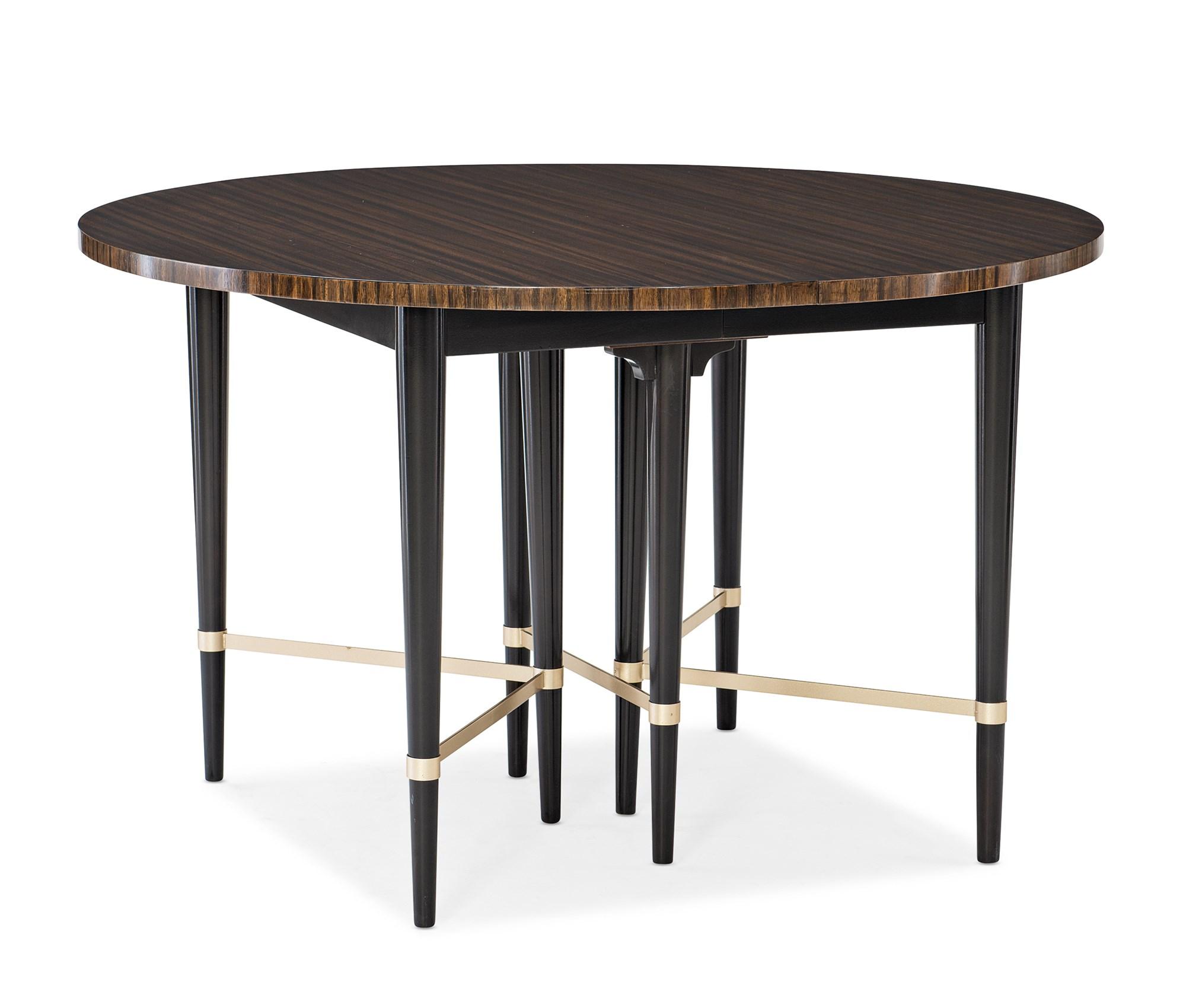 

    
Black Saddle & Neutral Metallic Extandable Dining Table JUST SHORT OF IT by Caracole
