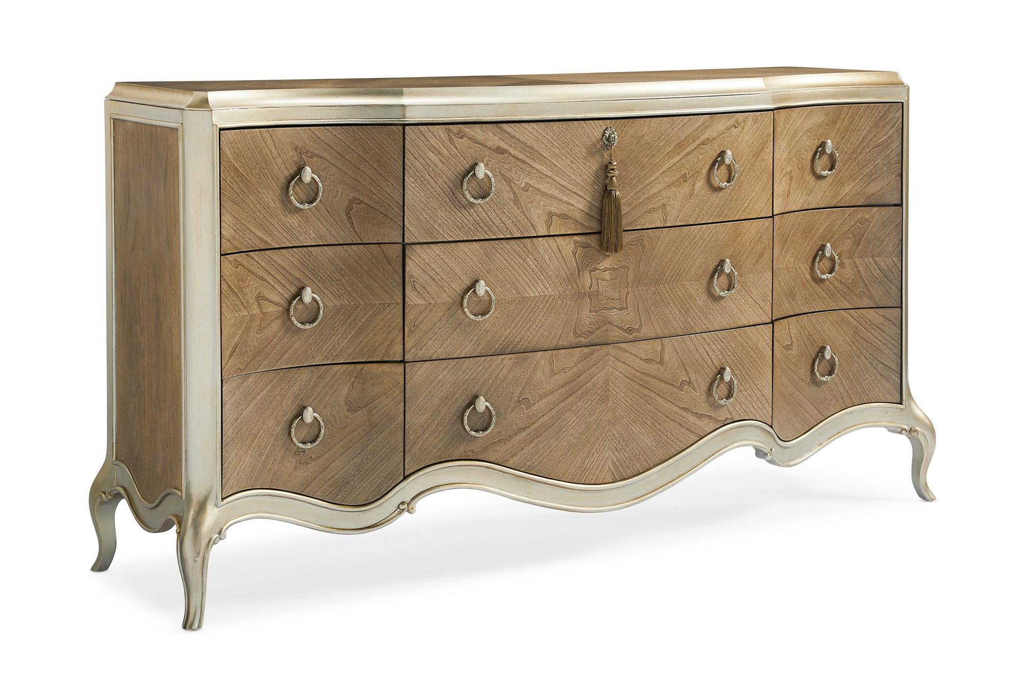 

    
Cendre & Champagne Mist 9 Drawers Triple Dresser FONTAINEBLEAU by Caracole
