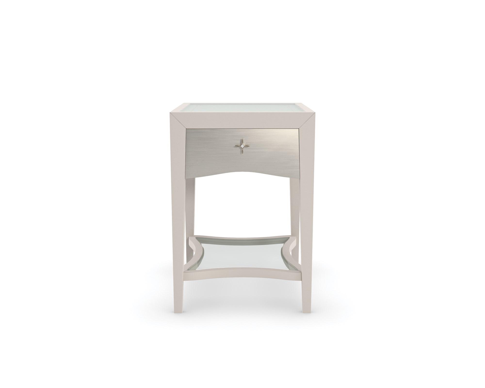 

    
Clear Glass Top & Frame in Matte Pearl End Table LITTLE CHARM by Caracole
