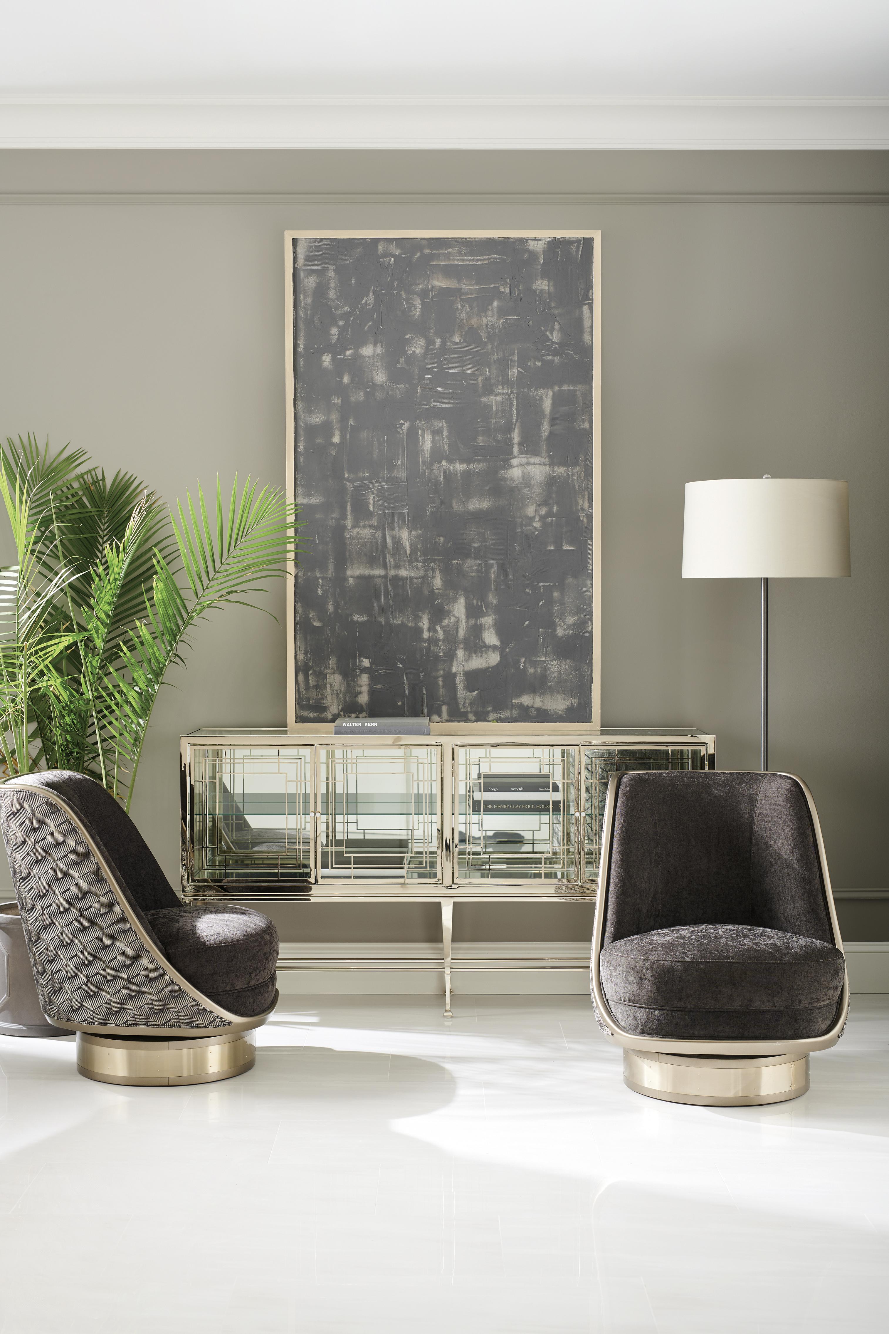 

    
Clear Glass & Whisper of Gold Cabinet and Accent Chairs Set 3Pcs WORTH ITS WEIGHT IN GOLD by Caracole
