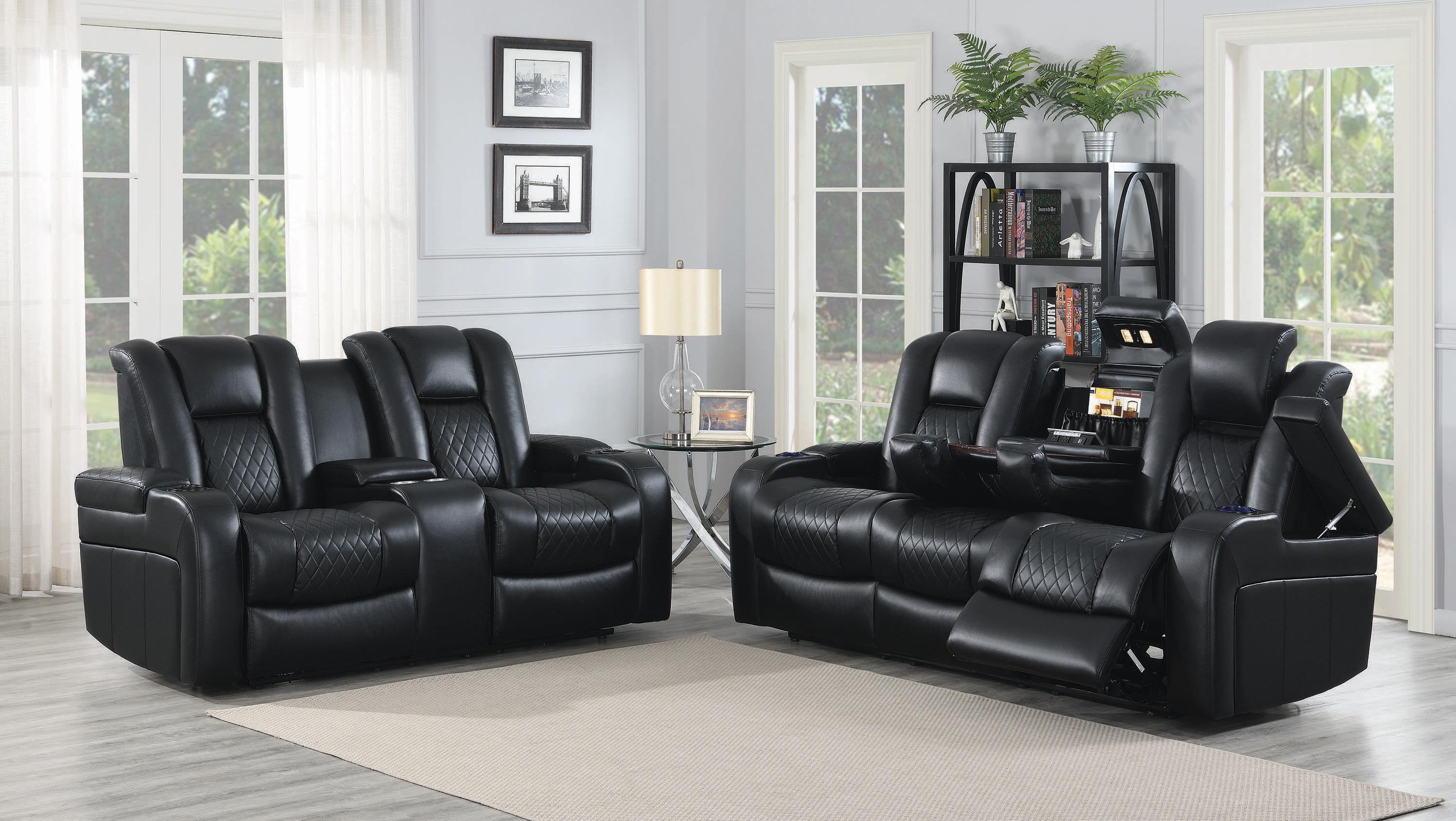 

    
 Shop  Contemporary Black Faux Leather Power Reclining Loveseat Coaster 602302P Delangelo
