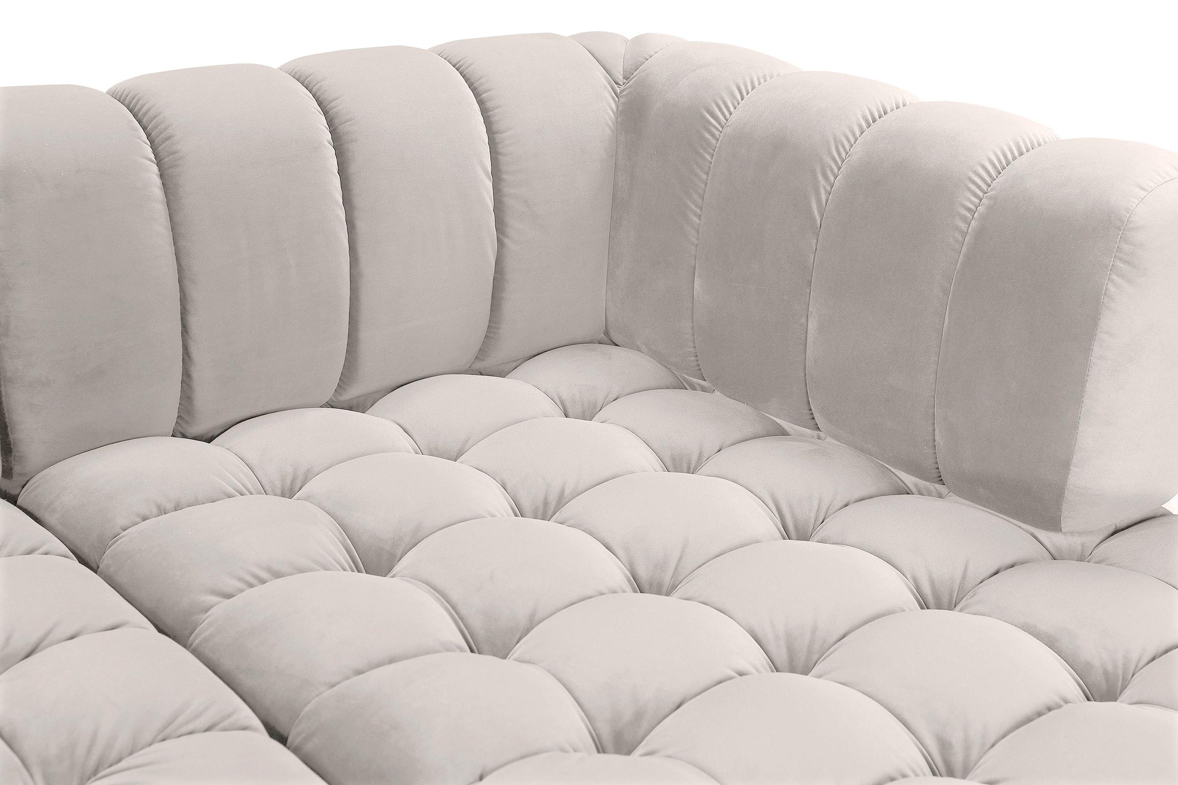 

    
653Cream-Sectional Meridian Furniture Sectional Sofa
