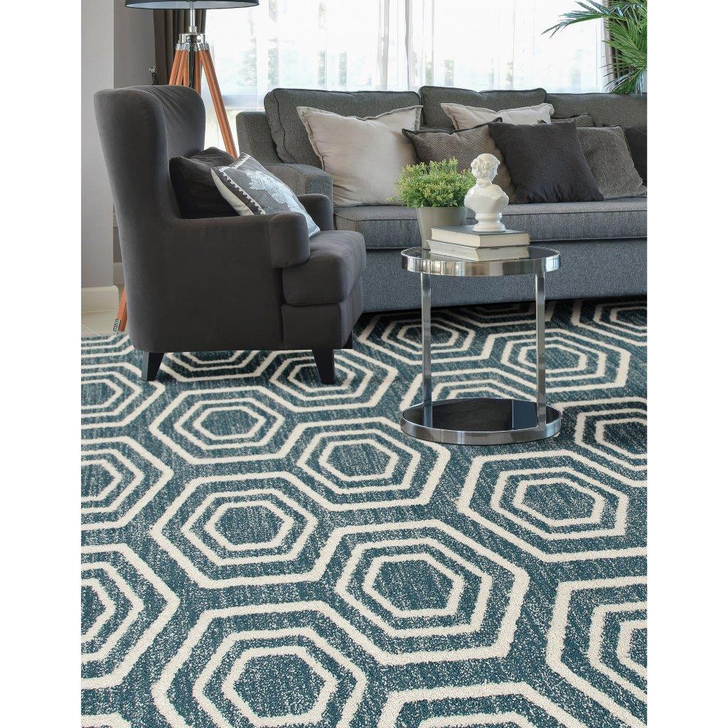 

    
Hailey Bees Knees Aqua 3 ft. 11 in. x 5 ft. 7 in. Area Rug by Art Carpet
