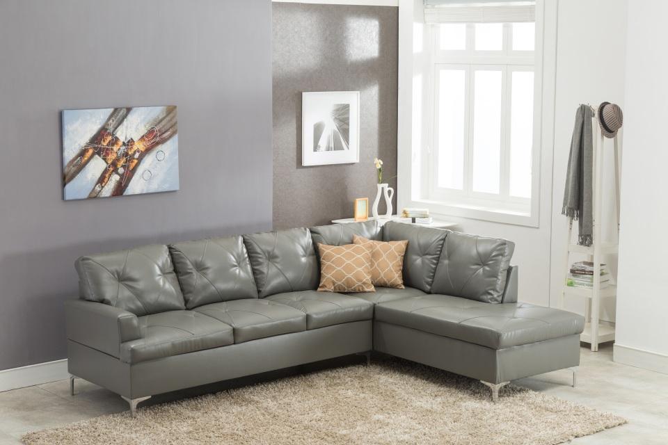 

    
Happy Homes Vintage Modern Grey Faux Leather Left Hand Chase Sectional w/Pillows
