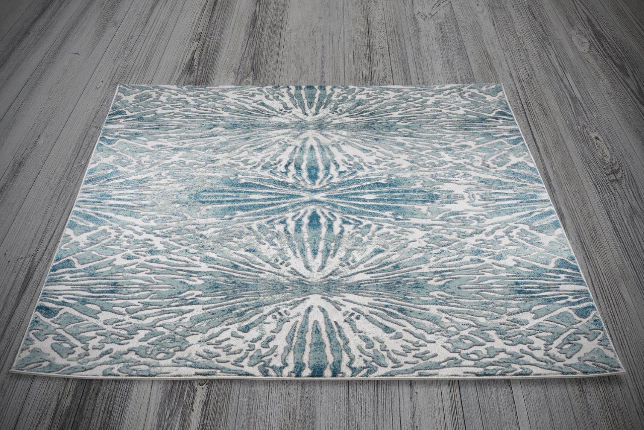 

    
Harlan Blue and Gray Burst Area Rug 8x10 by Art Carpet
