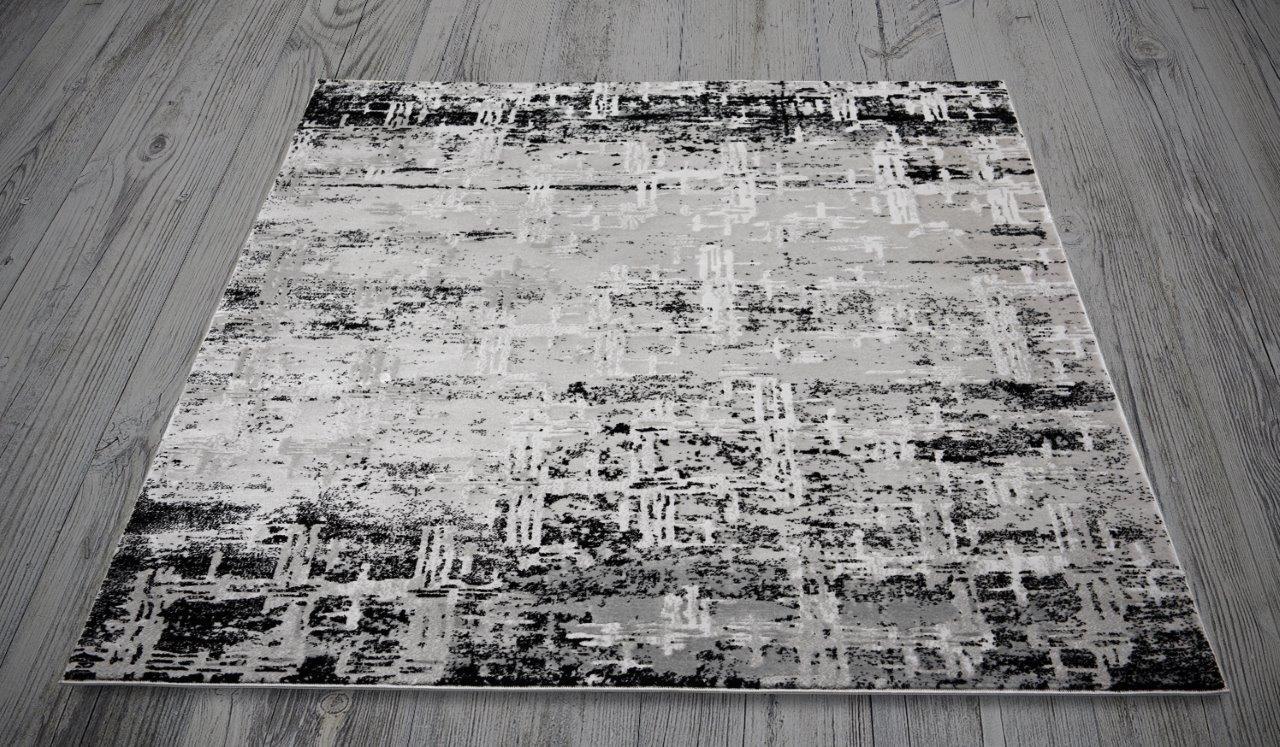 

    
Harlan Gray and Black Abtract Area Rug 5x8 by Art Carpet
