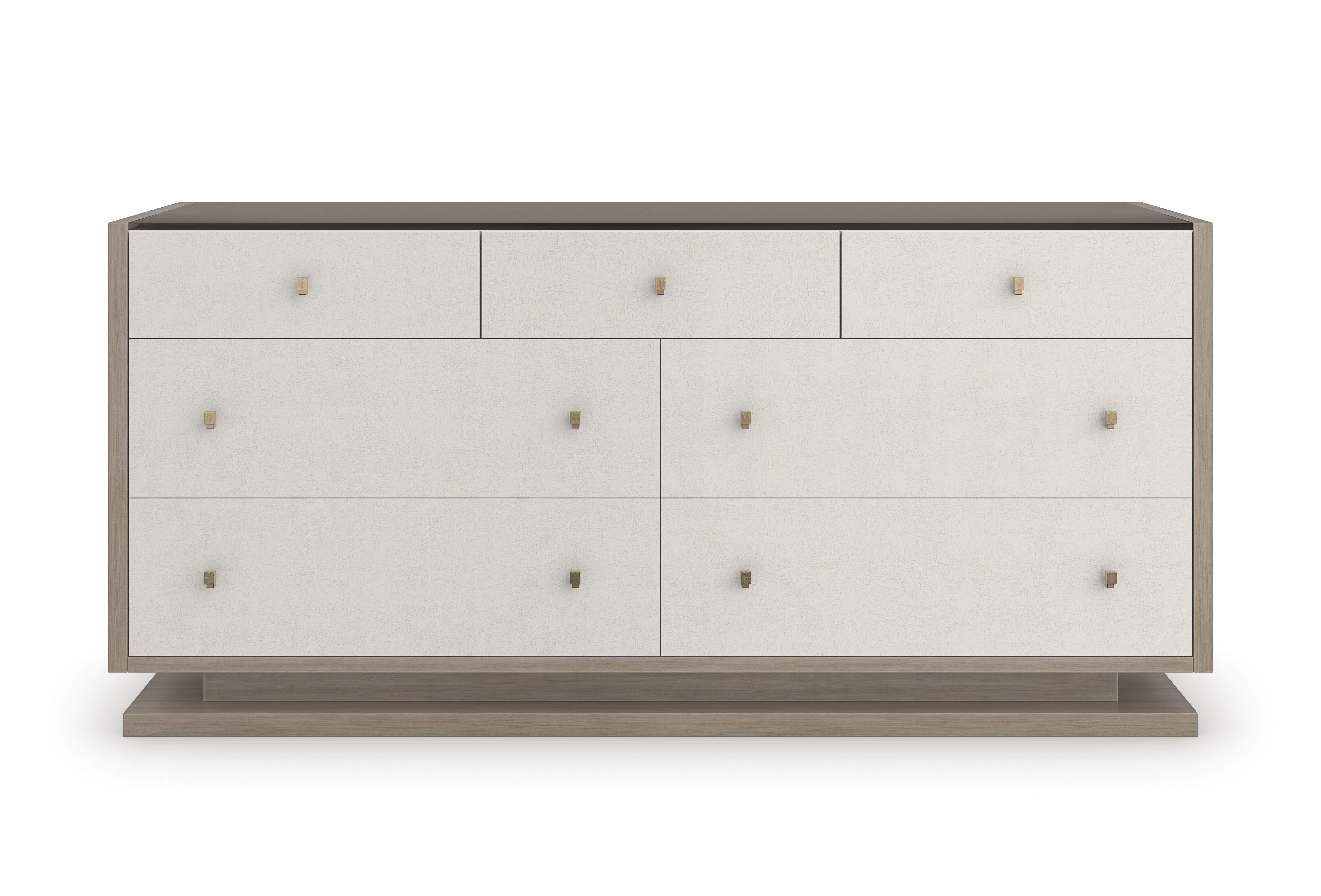 

    
Ivory & Dry Martini Finish Seven Drawers Dresser CALYPSO by Caracole
