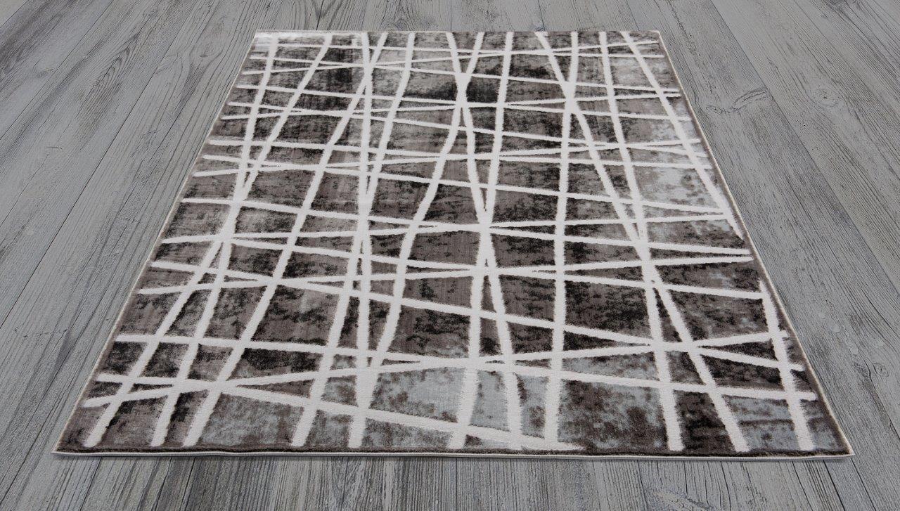 

    
Kailo Gray Lines Area Rug 5x8 by Art Carpet

