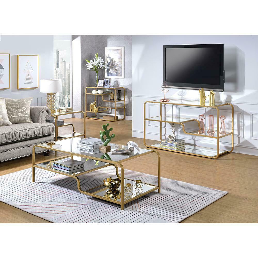 

    
 Shop  Modern Gold & Mirror Coffee Table + End Table + Sofa Table by Acme Astrid 81090-3pcs
