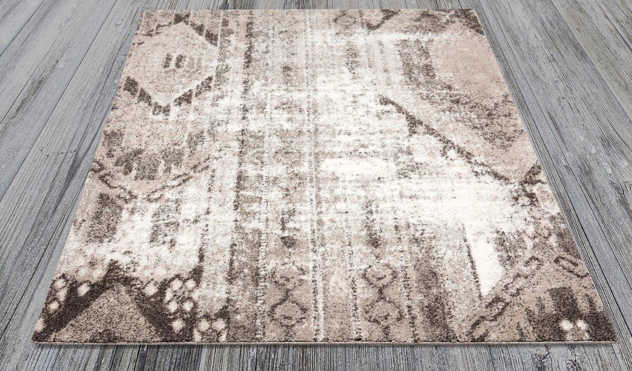 

    
Ramona Brown and Beige Graphic Area Rug 5x8 by Art Carpet
