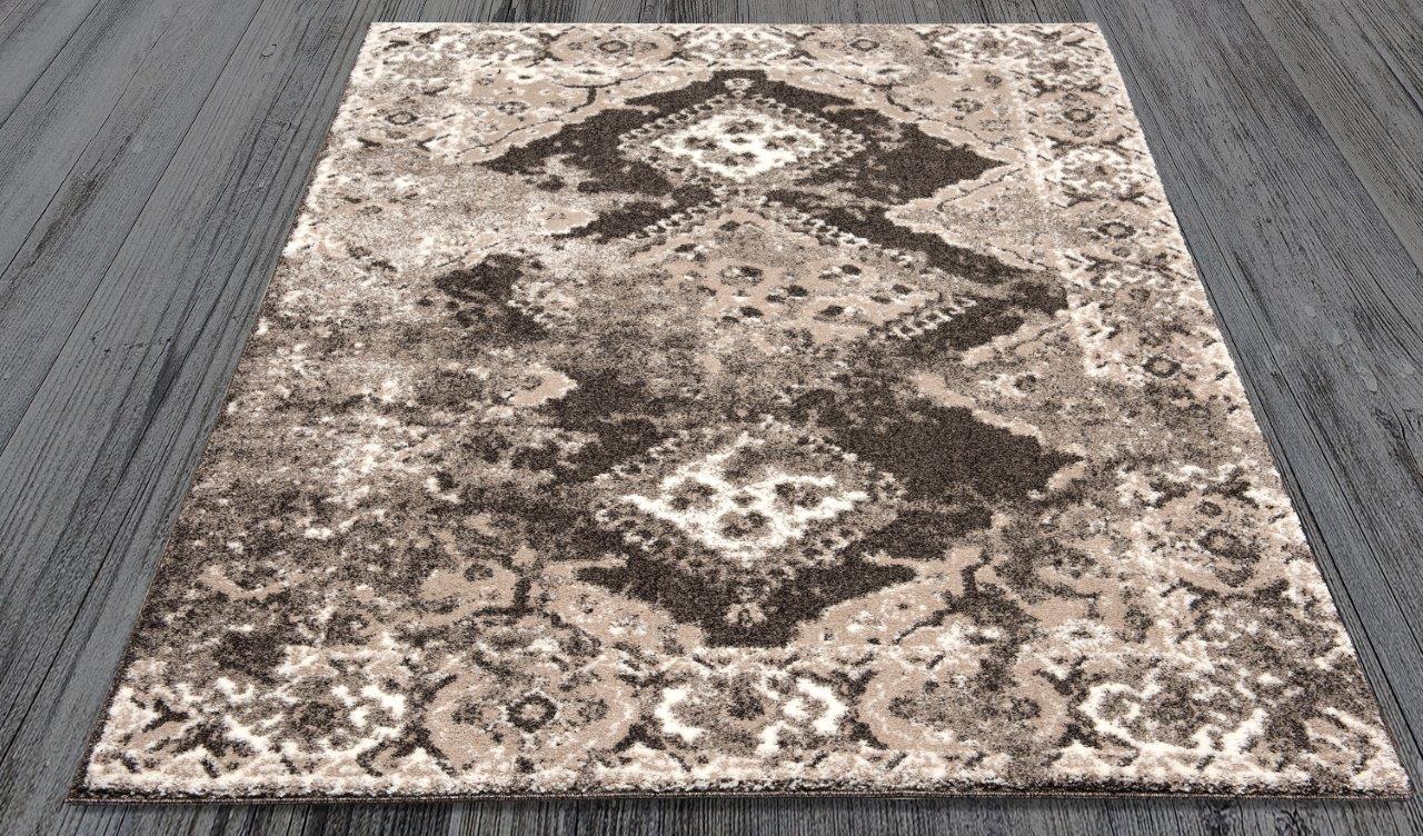 

    
Ramona Brown and Beige Medallion Area Rug 8x10 by Art Carpet
