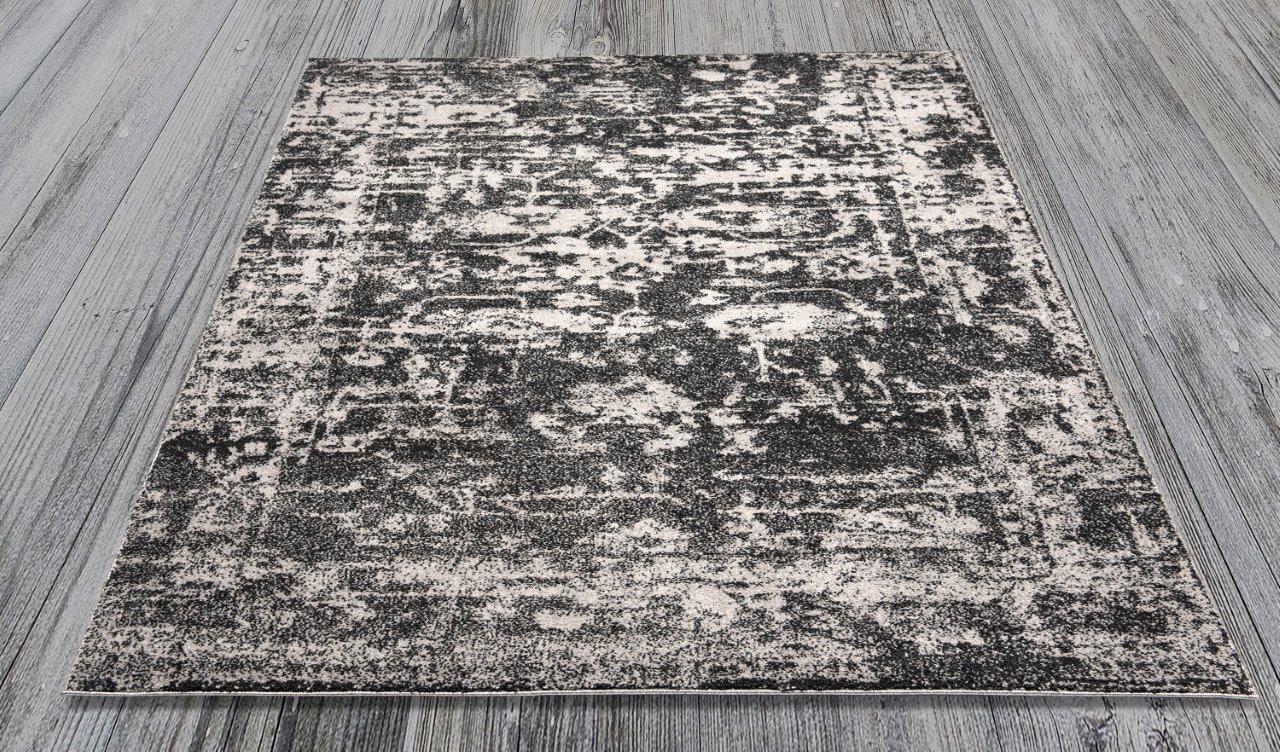 

    
Ramona Gray and Black Abstract Area Rug 5x8 by Art Carpet
