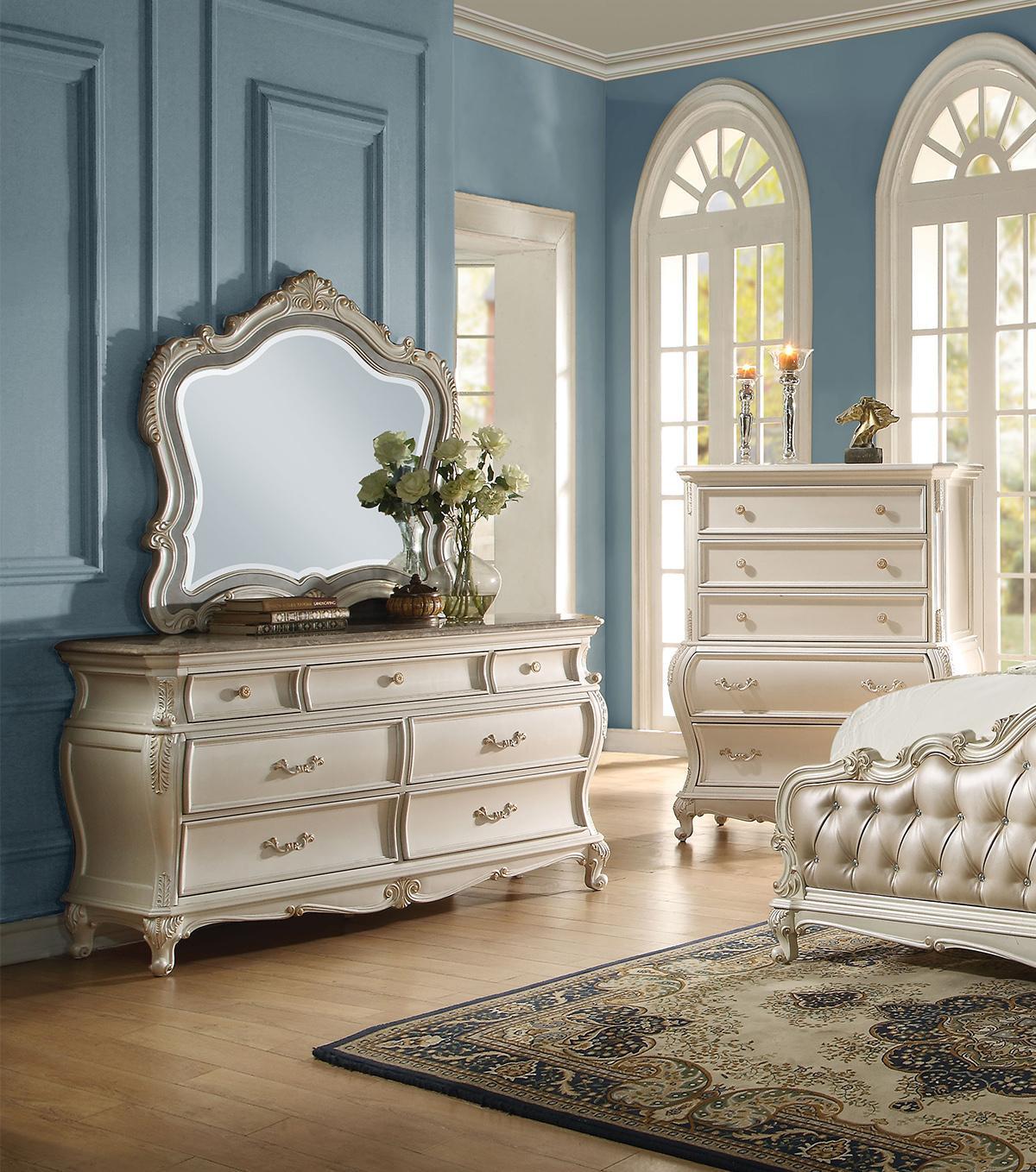 

    
SKU: AHST4697 Rory Queen Upholstered Standard Bedroom Set 5 Rose Gold Pearl White Classic
