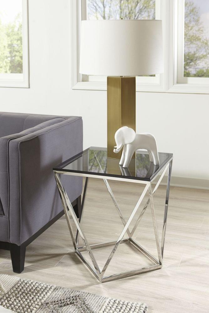 

    
 Shop  Smoked Glass and Polished Stainless Steel Coffee Table Set 3Pcs ARIA by Modus Furniture

