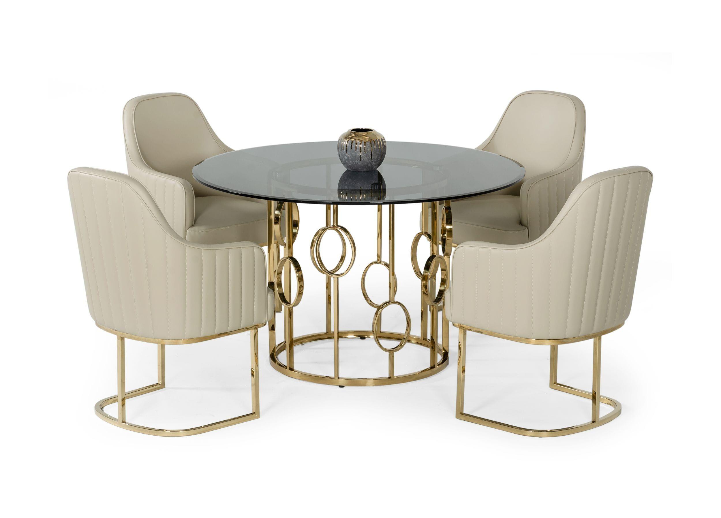 

    
Smoked Glass & Champagne Gold Dining Table + 4 Chairs by VIG Modrest Filbert
