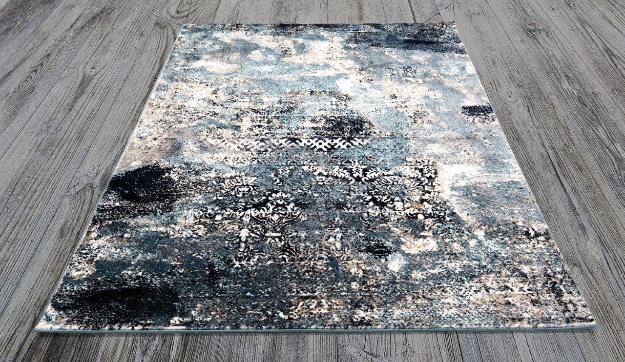 

    
Teledo Navy and Blue Abstract Tile Area Rug 5x8 by Art Carpet
