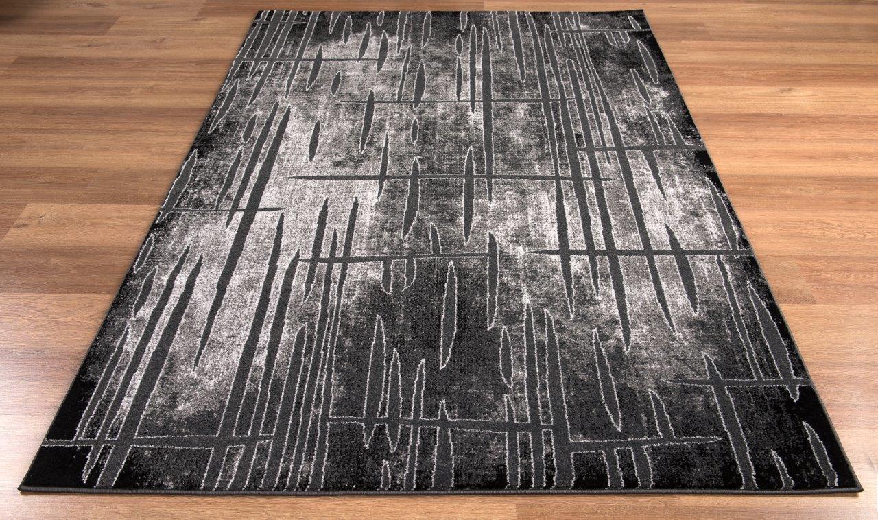 

    
Tortola Black and Gray Abstract Area Rug 8x10 by Art Carpet
