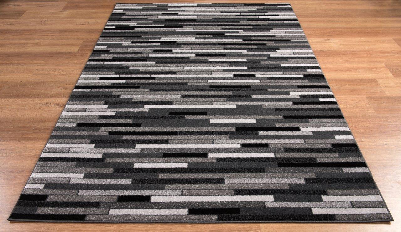 

    
Tortola Black and Gray Blocks Area Rug 5x8 by Art Carpet

