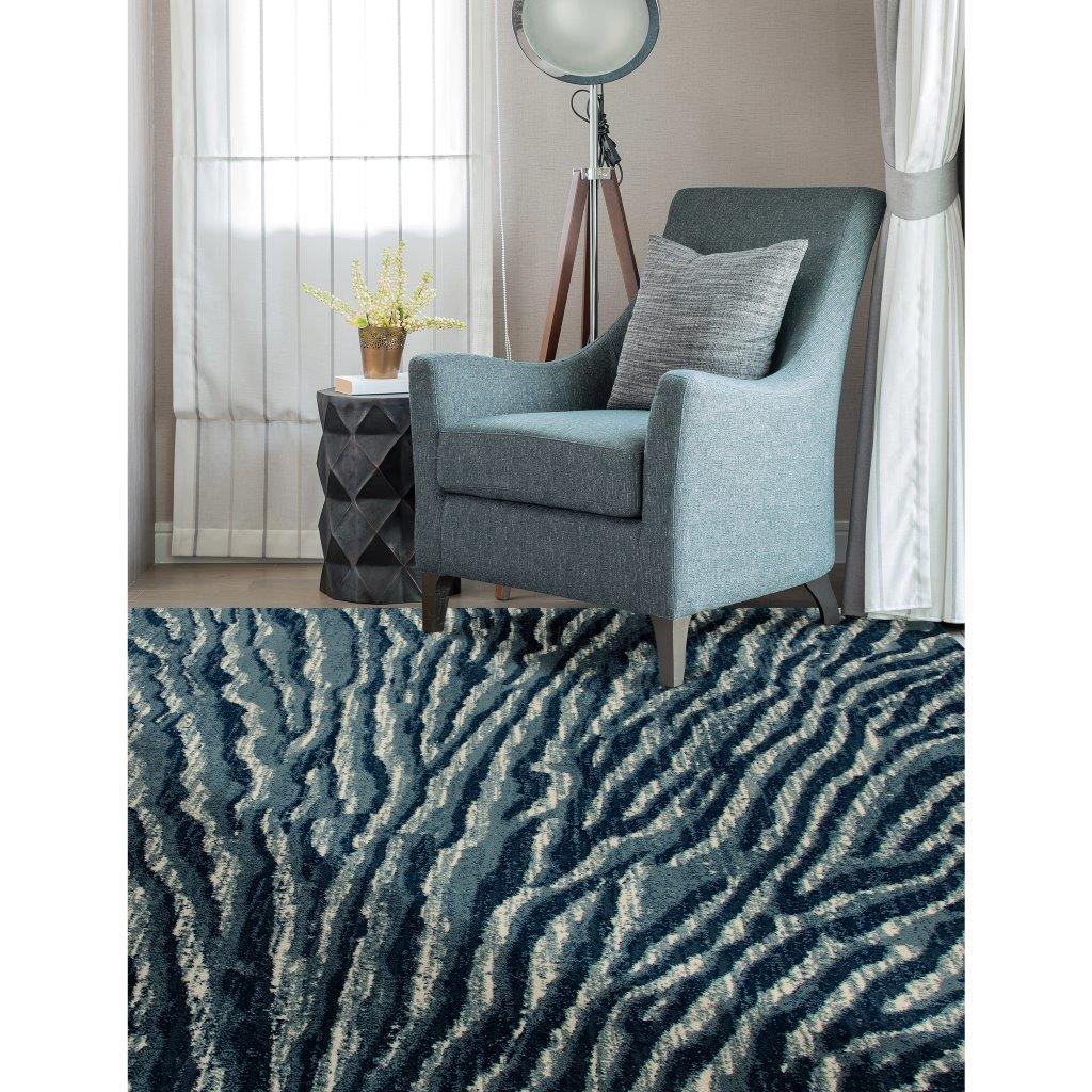 

    
Tracy Ripple Blue 5 ft. 3 in. x 7 ft. 7 in. Area Rug by Art Carpet
