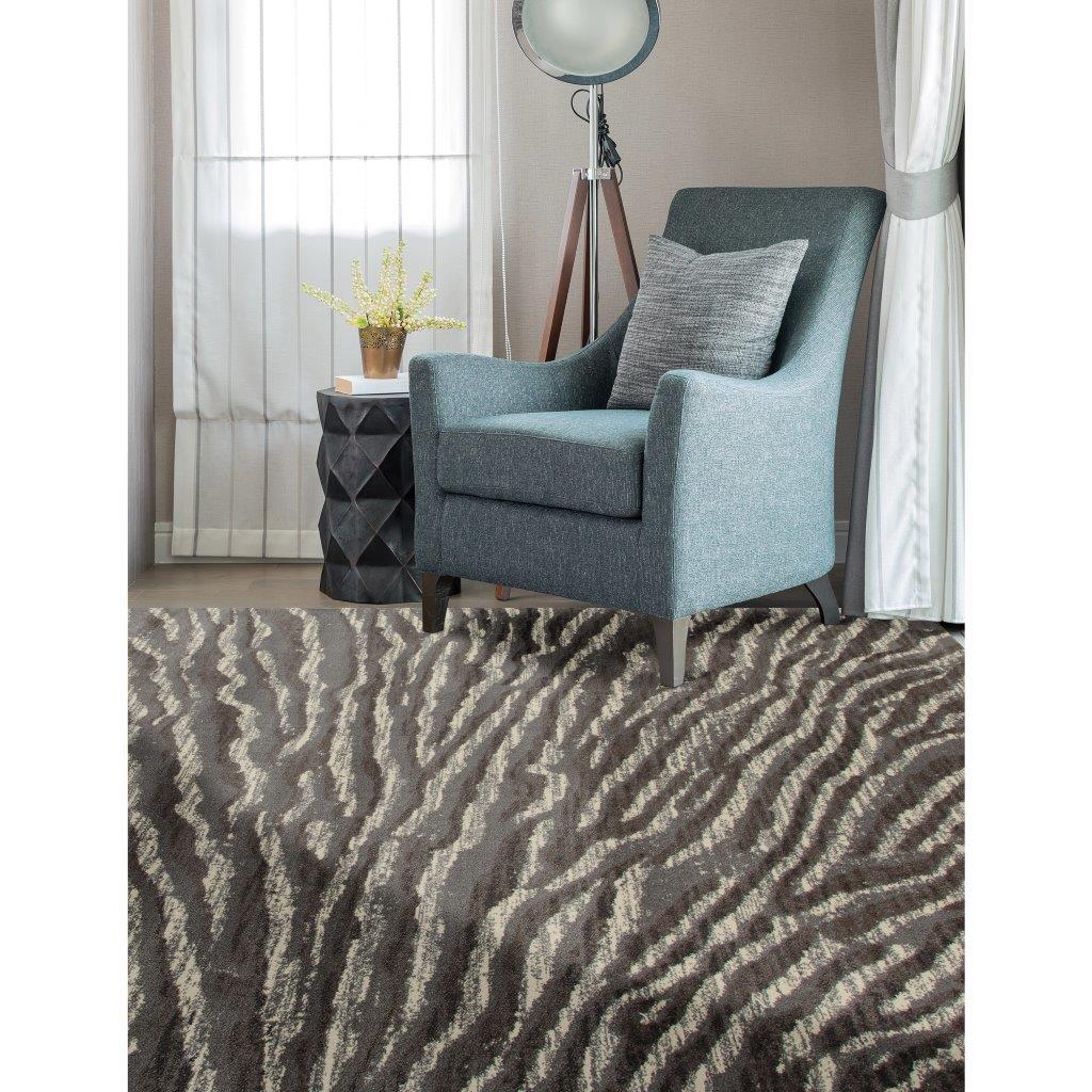 

    
Tracy Ripple Gray 5 ft. 3 in. Round Area Rug by Art Carpet
