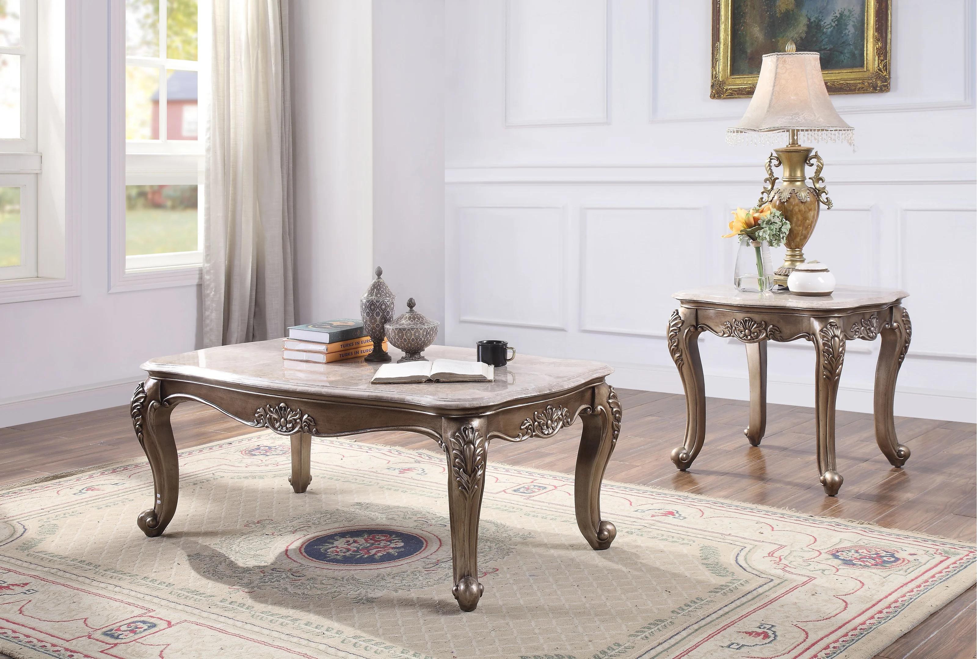 

    
Traditional Beige Marble & Champagne Coffee Table + 2 End Tables by Acme Jayceon 84865-3pcs
