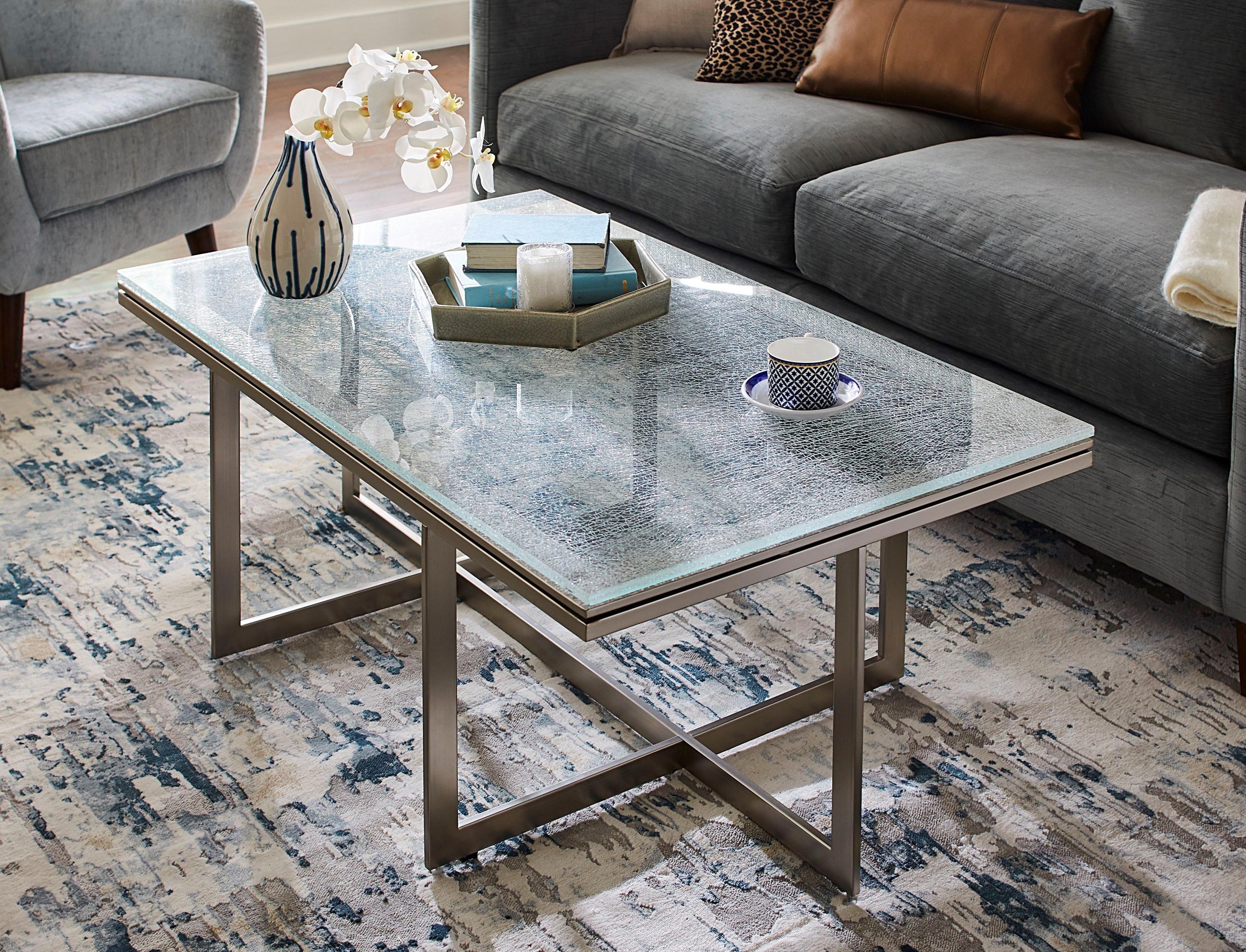 

    
Ultra-clear Crackled Glass Metal Base Coffee Table ELIZA by Modus Furniture
