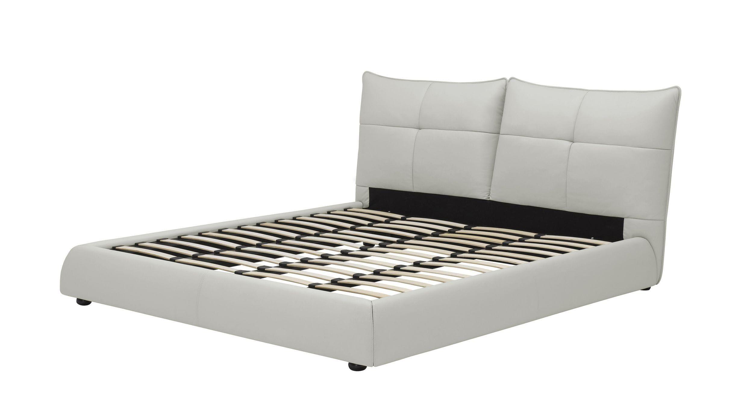 

    
White Genuine Leather King Size Panel Bed by VIG Modrest Patrick
